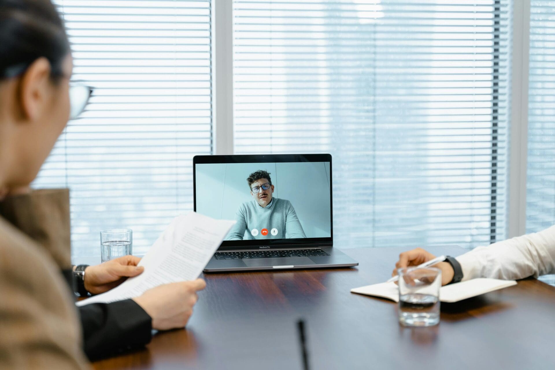 Virtual Business Meeting in a Modern Office Setting